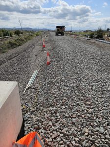Ballast being laid on the formation treatment to required widths