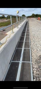 Troughing installation over the smaller underbridge.