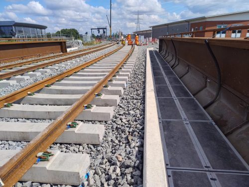 Installed troughing, and 2 lines across bridge.